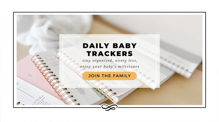 An elegant promotional image for The Everyday Mother journal, featuring an inviting call to 'JOIN THE FAMILY' with the tagline 'DAILY BABY TRACKERS - stay organized, worry less, enjoy your baby’s milestones.' The image shows several open journals with soft pink and white covers and gold spiral binding, laid out on a neutral surface alongside a white baby blanket. The layout is designed to appeal to new parents looking for a stylish and functional way to record their baby's growth and development.